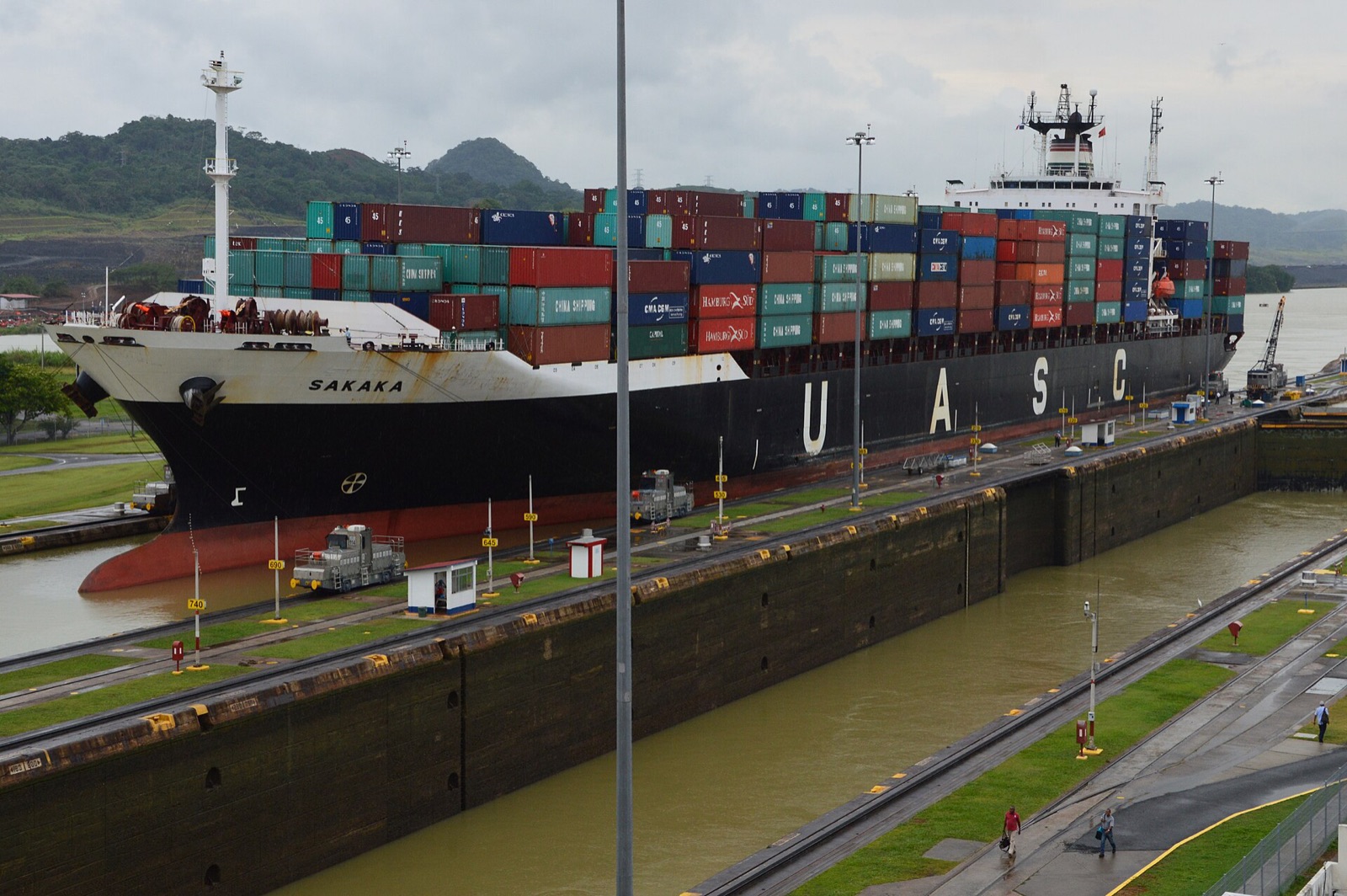 A container ship inside the Miraflores Locks on the Panama Canal, seen from the visitor centre
