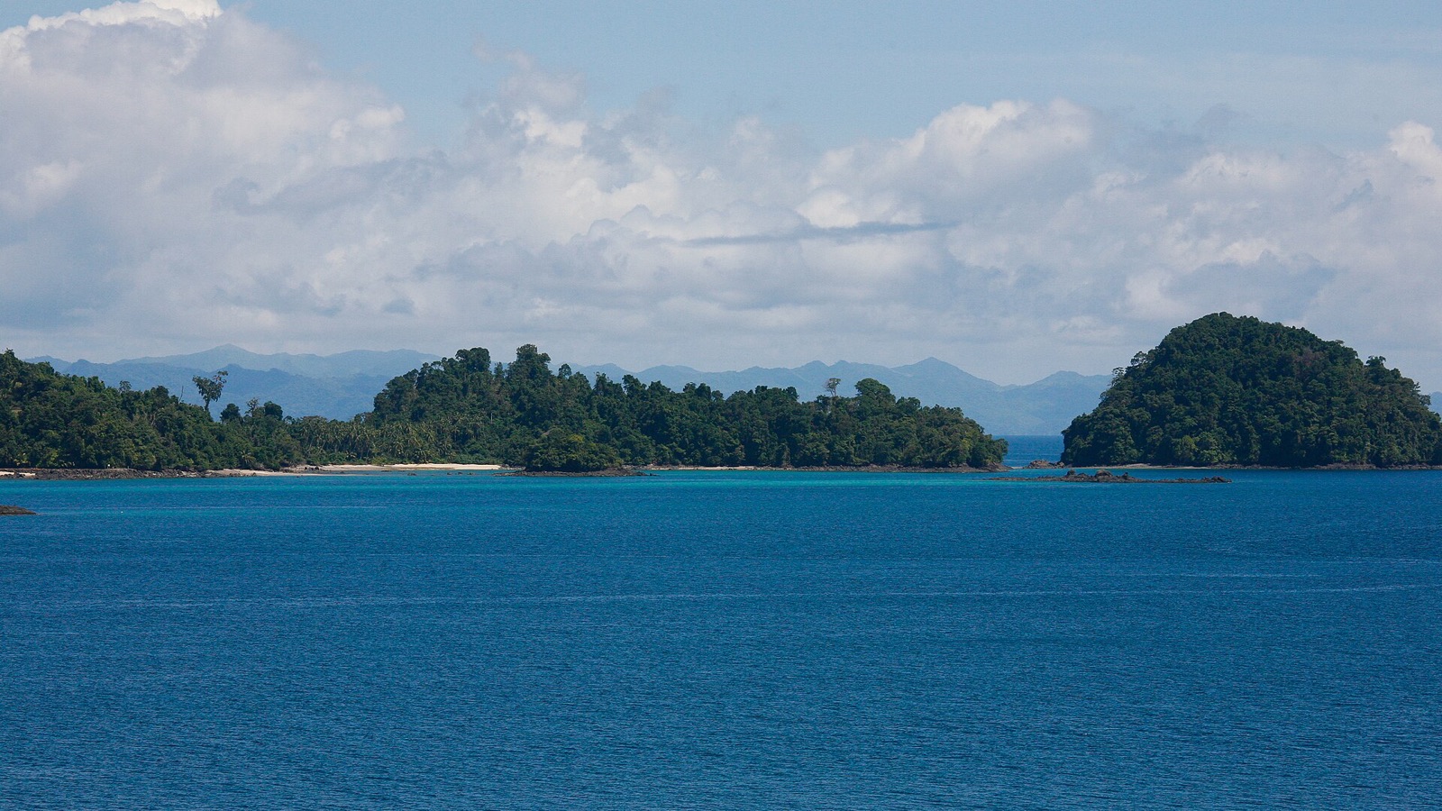 Forested islands and open Pacific water seen from Isla Coiba, in Coiba National Park, Panama